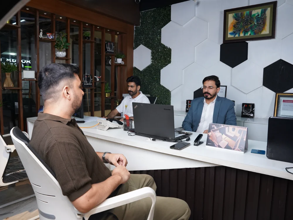 Application files being prepared and checked at the Al Zohra visa counter