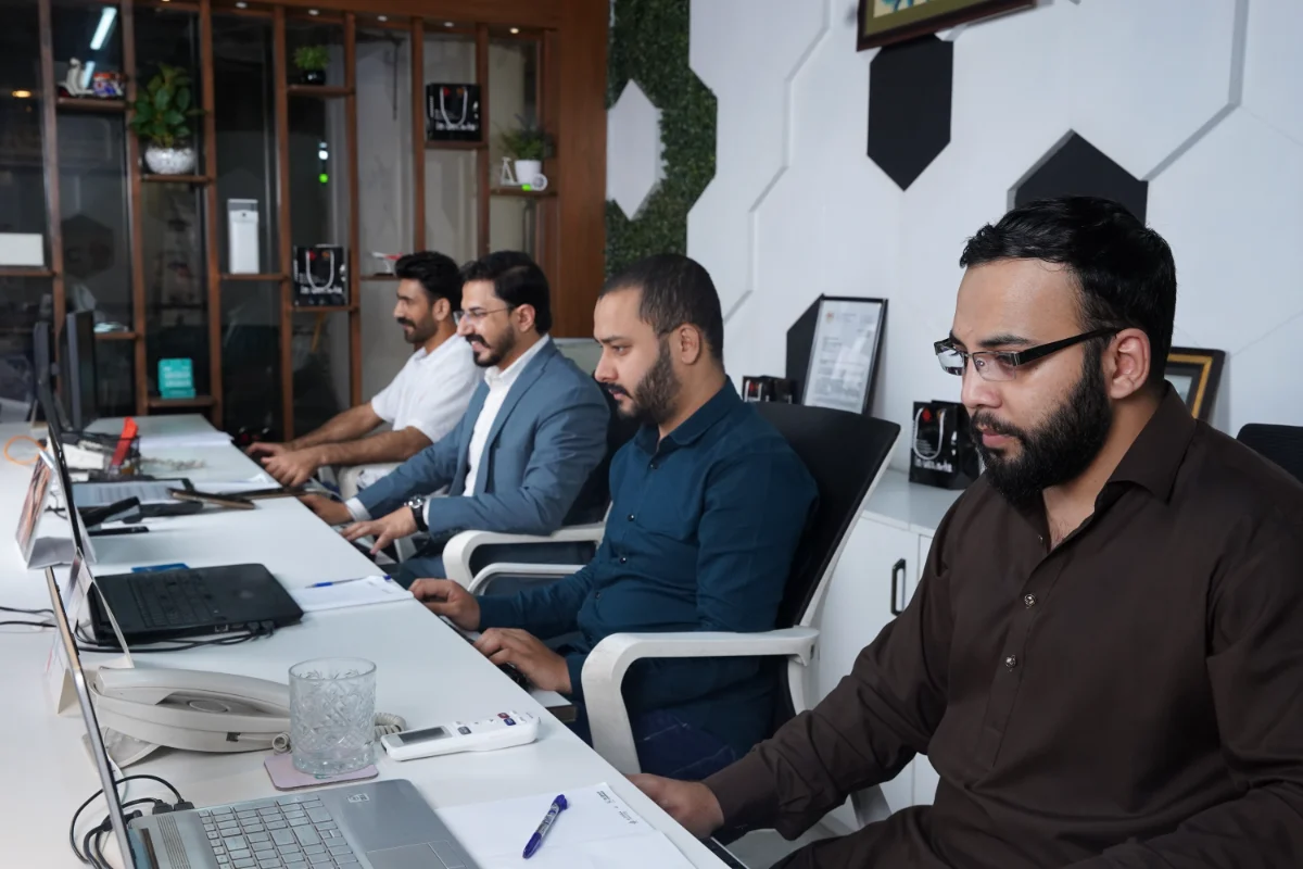 The Al Zohra corporate travel desk in session at the Blue Area office