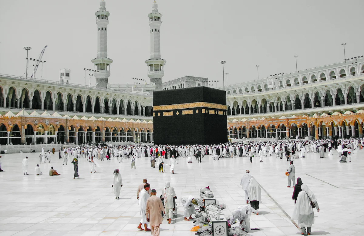 Pilgrims in the courtyard of Masjid al-Haram in Makkah